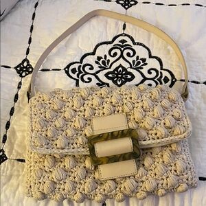 Elegant Cream Handbag with Buckle Detail